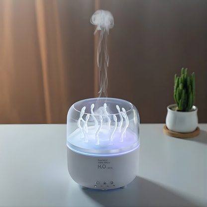 Humidifier with jellyfish design on a table next to a plant