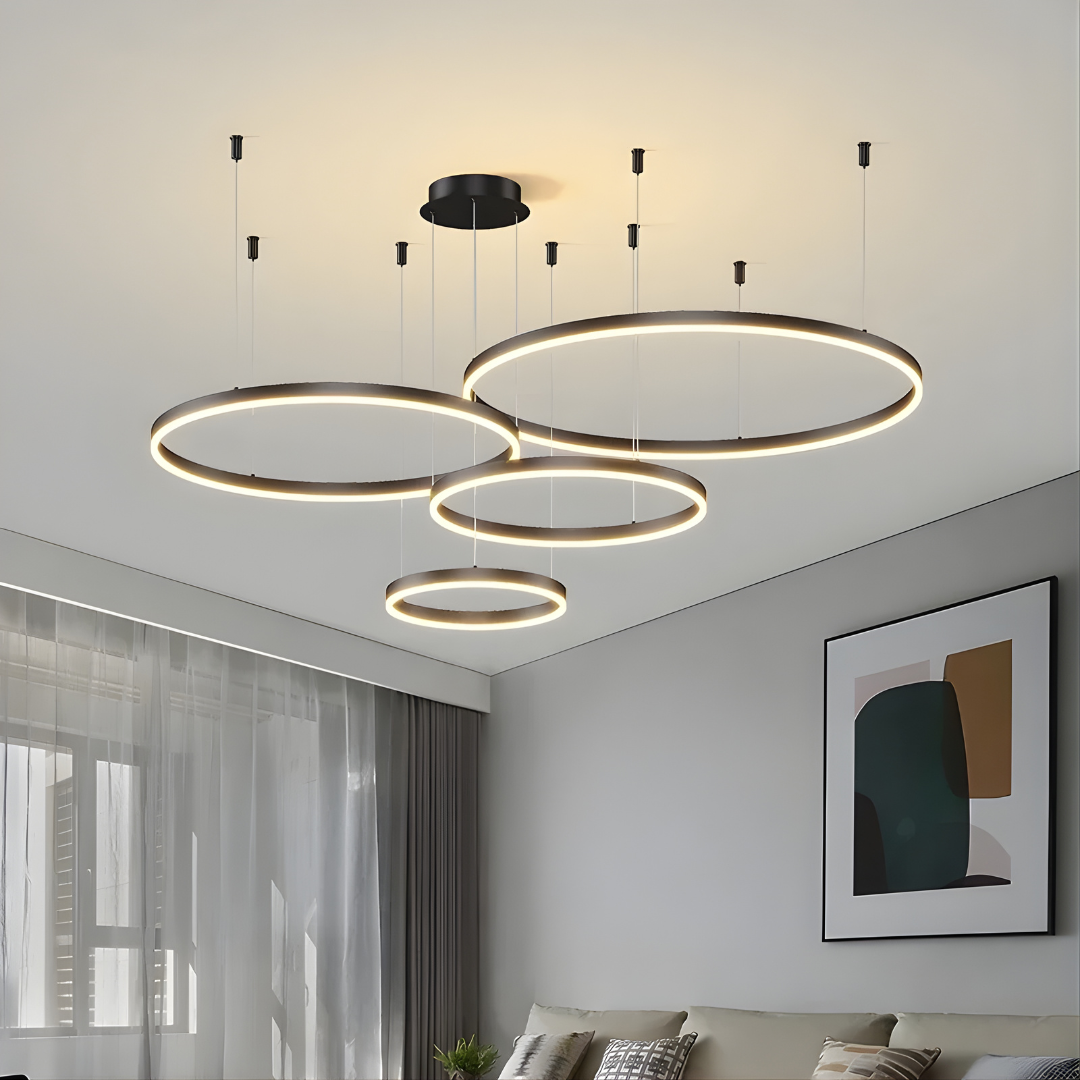 Modern chandelier with circular lights in a living room setting