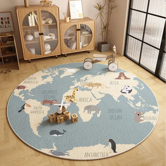 Round world map rug on a wooden floor with children's toys around