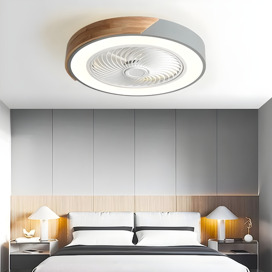 Ceiling fan in a modern bedroom setting with neutral colors