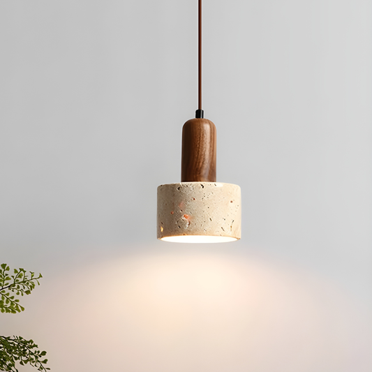 Pendant light with wooden top and concrete base on a neutral background