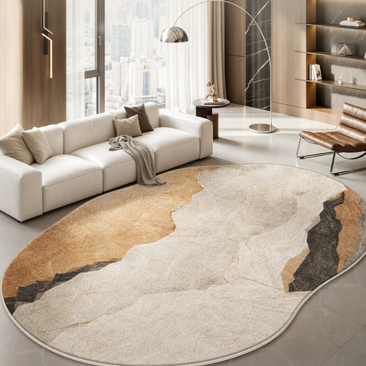 Modern living room with a large sectional sofa and a decorative rug.