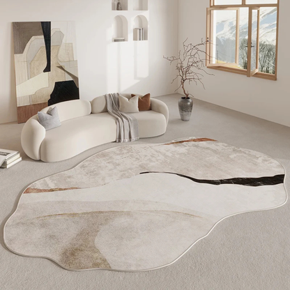 Modern living room with a curved sofa and abstract rug